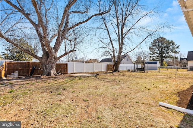 view of yard featuring a fenced backyard