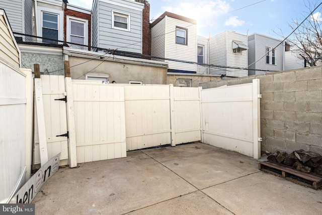 view of patio / terrace featuring a gate and fence