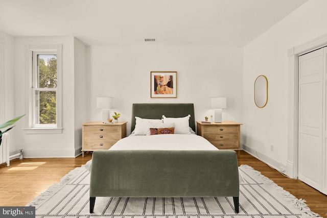 121 Kentucky Ave SE, Washington, DC 20003 - bedroom featuring baseboards and wood finished floors