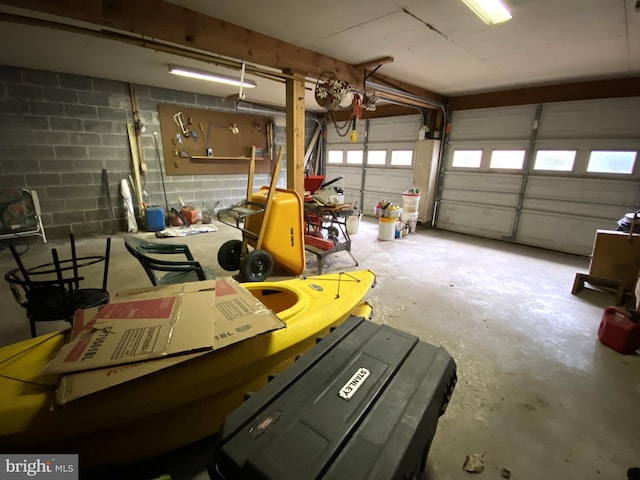 garage featuring concrete block wall