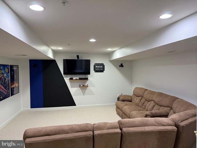 living room with baseboards, carpet flooring, and recessed lighting