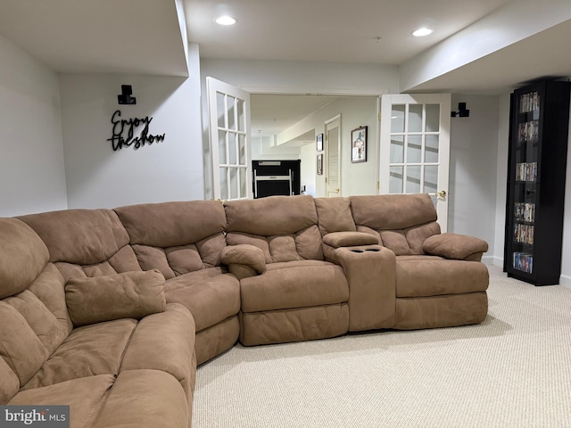 carpeted living room with baseboards and recessed lighting