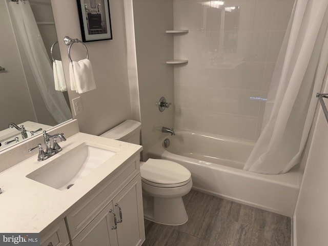 bathroom with toilet, shower / bathtub combination with curtain, wood finished floors, and vanity