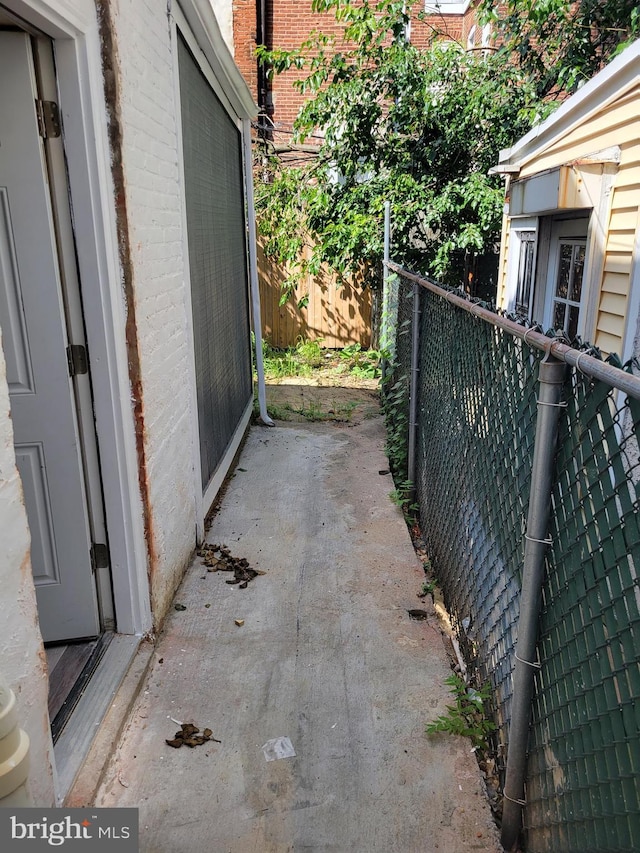 view of patio / terrace featuring fence