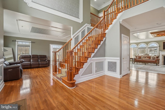 2205 Dhow Ct, Bowie, MD 20721 - stairs featuring hardwood / wood-style flooring and crown molding