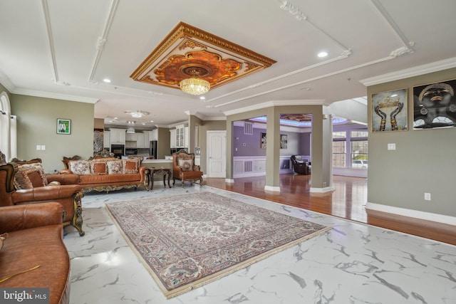 2205 Dhow Ct, Bowie, MD 20721 - living room featuring crown molding, marble finish flooring, recessed lighting, a raised ceiling, and ornate columns