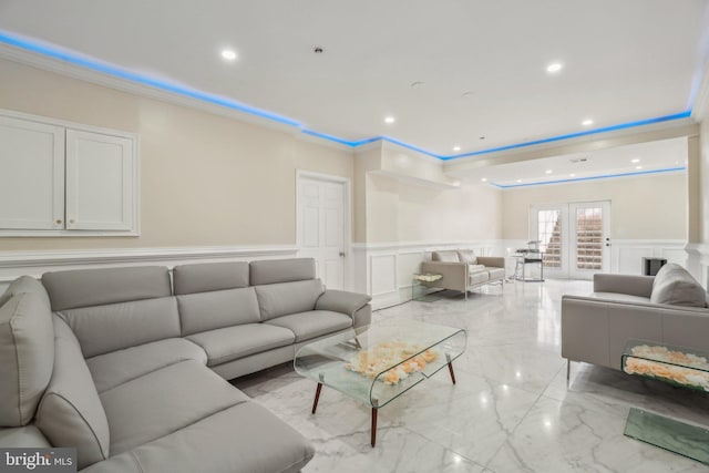 2205 Dhow Ct, Bowie, MD 20721 - living room featuring a decorative wall, crown molding, wainscoting, marble tiled flooring, and recessed lighting