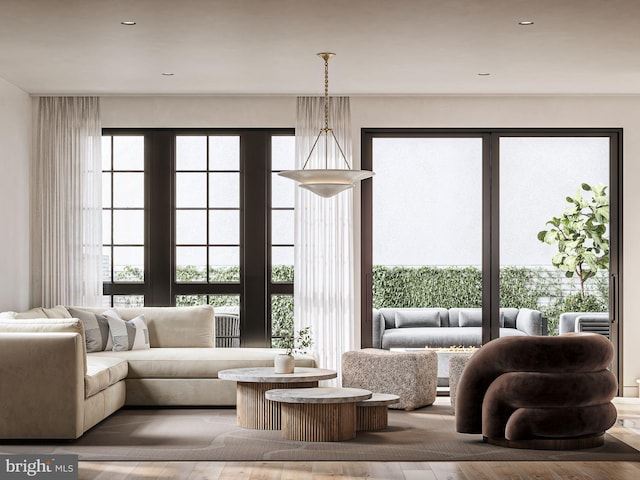 living room with wood finished floors and a wealth of natural light