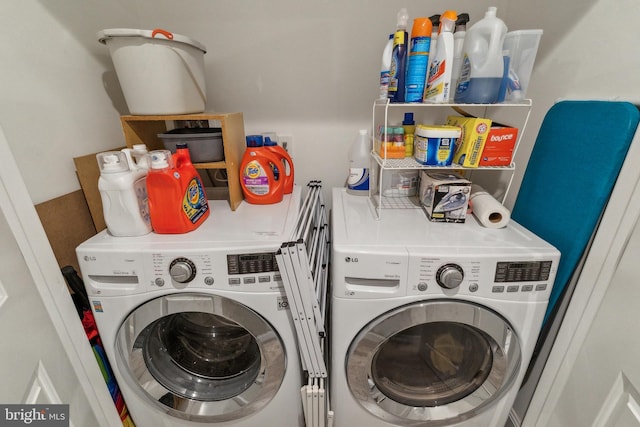 washroom with washing machine and dryer