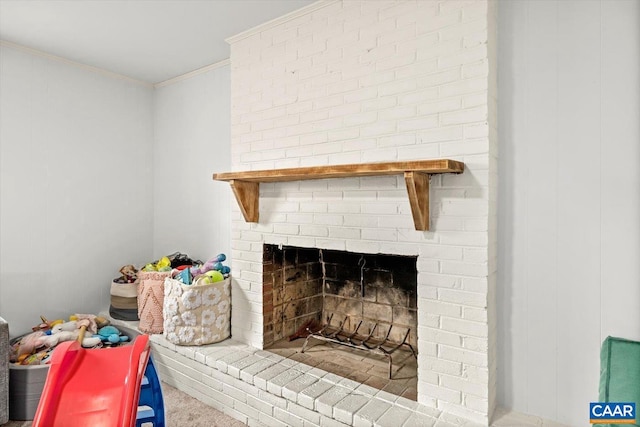 details with ornamental molding and a fireplace