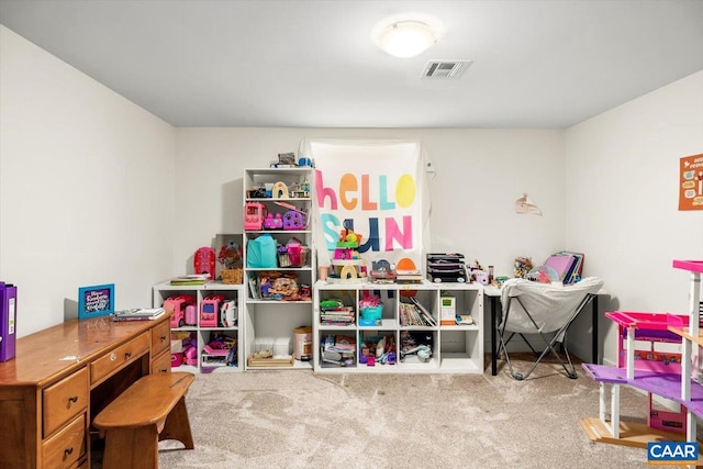 recreation room with carpet floors and visible vents