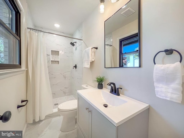 bathroom featuring visible vents, toilet, marble finish floor, vanity, and a shower stall