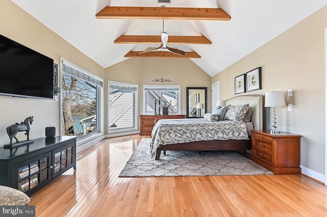 bedroom featuring beamed ceiling, baseboards, high vaulted ceiling, and light wood finished floors