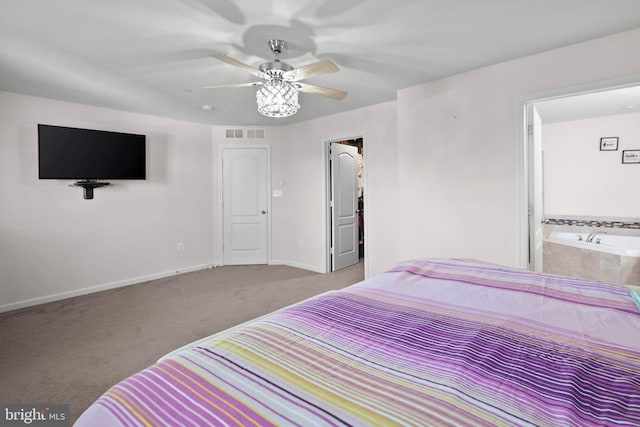 bedroom with a ceiling fan, baseboards, visible vents, carpet flooring, and connected bathroom