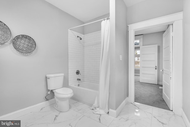 full bath featuring shower / bath combination with curtain, marble finish floor, and baseboards