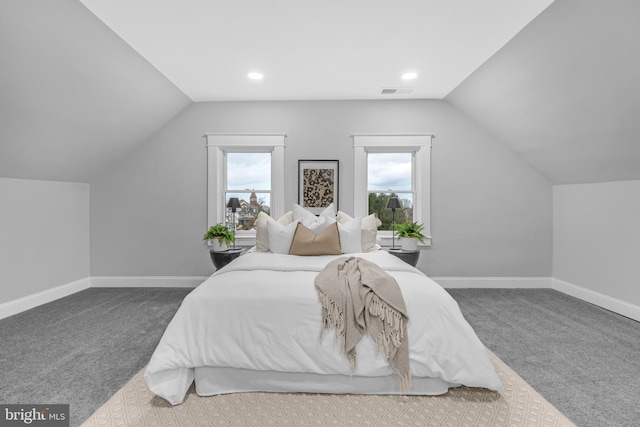 bedroom featuring lofted ceiling, recessed lighting, carpet floors, visible vents, and baseboards