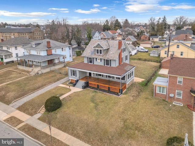 drone / aerial view with a residential view