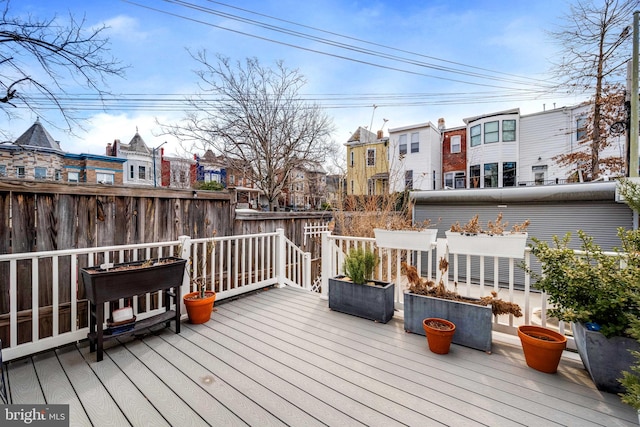 wooden deck featuring fence