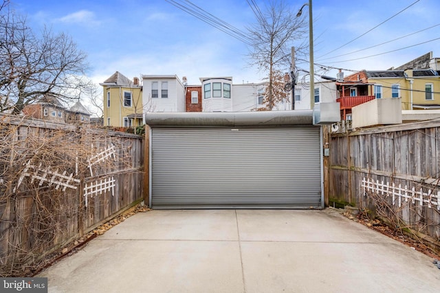 garage featuring fence