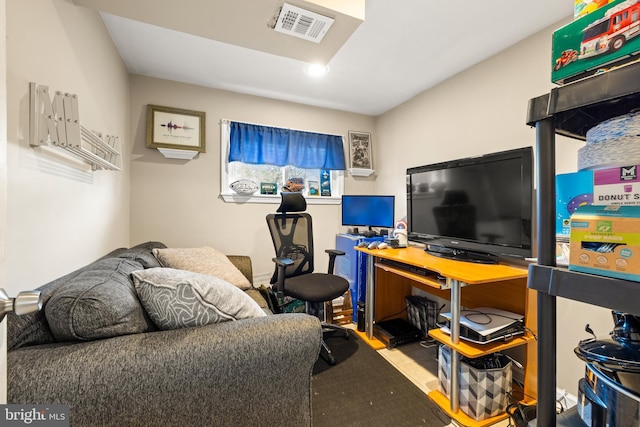 living area featuring visible vents