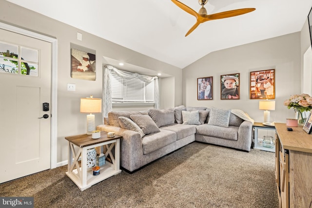 living room with carpet floors, vaulted ceiling, and a ceiling fan