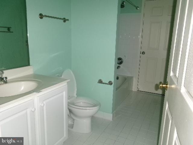 bathroom with toilet, shower / tub combination, and vanity