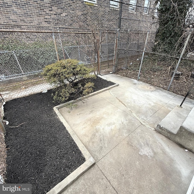 view of patio with fence