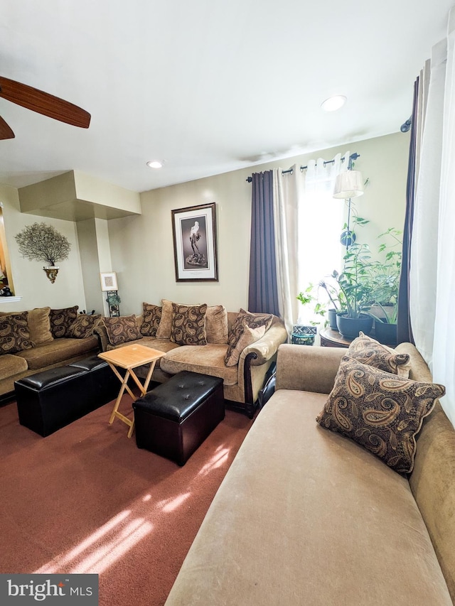 living area with carpet floors and recessed lighting