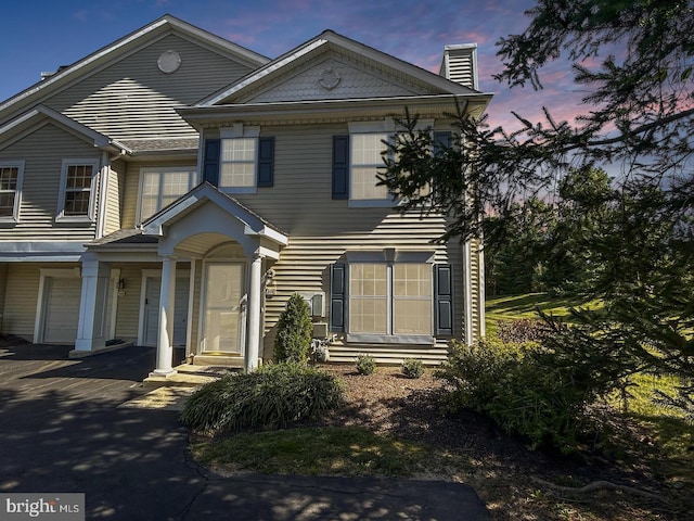 view of front of house featuring a garage and driveway