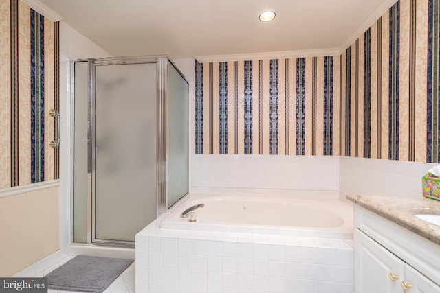 full bathroom with tile patterned flooring, a stall shower, vanity, and a bath