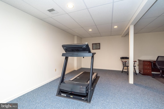 exercise area with a drop ceiling, visible vents, baseboards, and recessed lighting