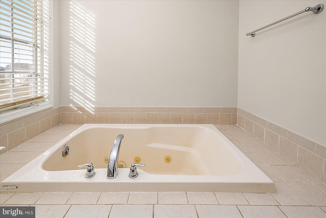 full bathroom with a whirlpool tub