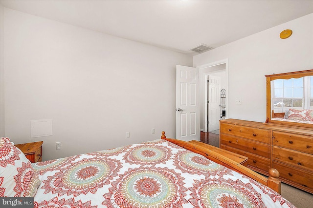 bedroom with visible vents