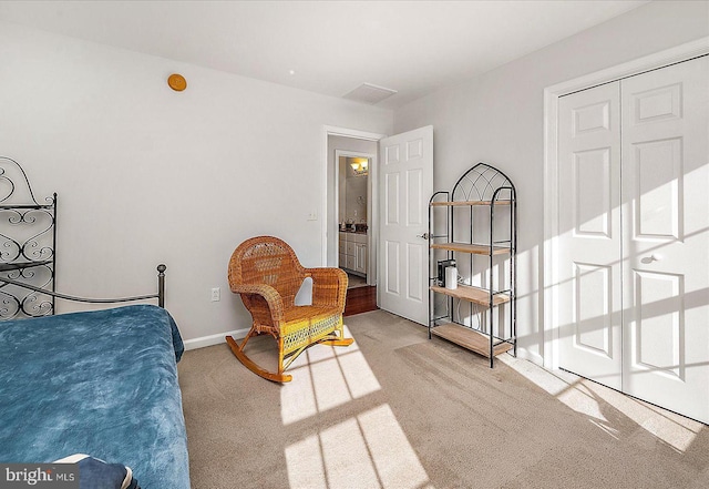 bedroom with carpet and baseboards