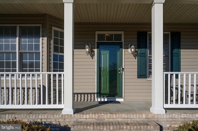 entrance to property with covered porch