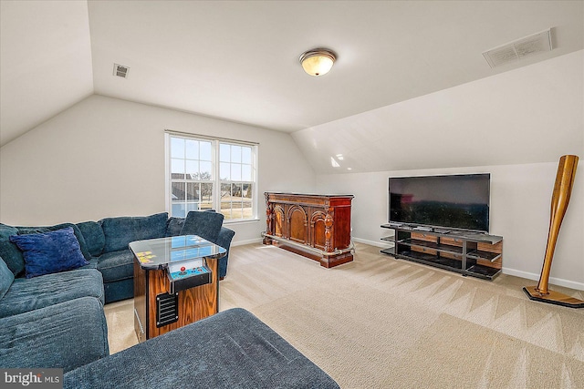 living room featuring baseboards, visible vents, vaulted ceiling, and carpet flooring