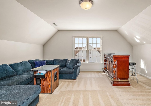 living area featuring carpet floors, lofted ceiling, visible vents, and baseboards