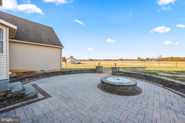 view of patio featuring fence