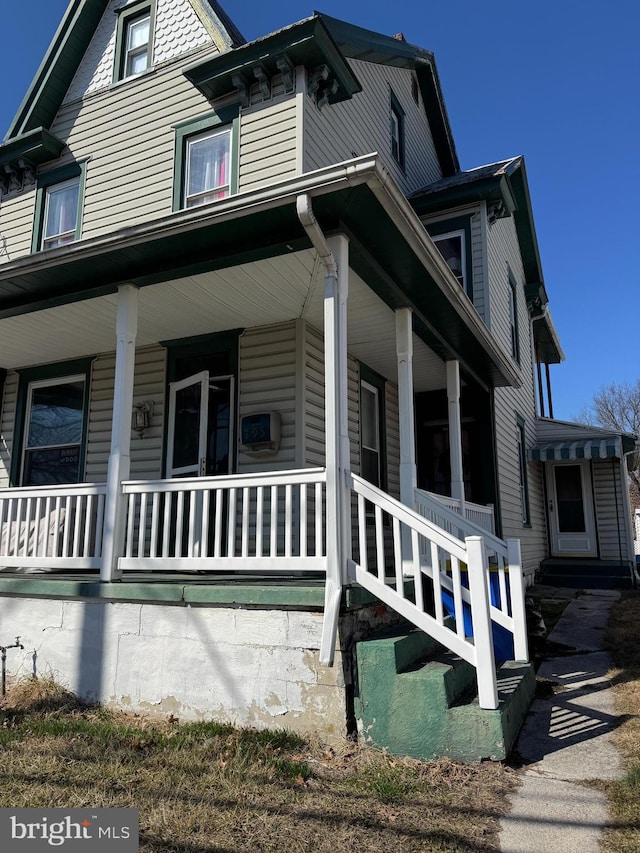 view of home's exterior featuring covered porch