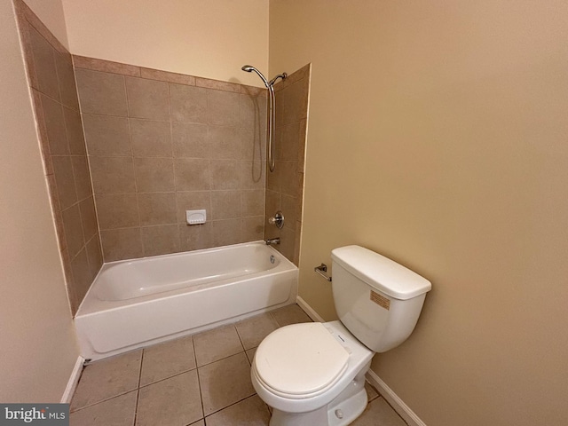 full bath with tile patterned flooring, baseboards, and toilet