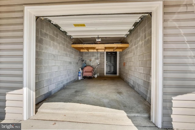 garage featuring a garage door opener