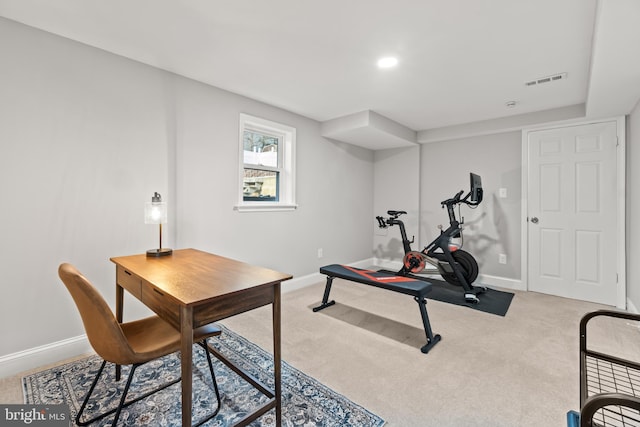 workout room with carpet, visible vents, and baseboards