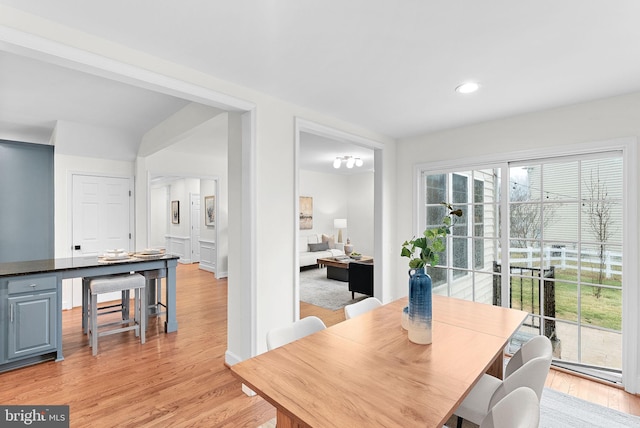 dining area featuring light wood-style flooring and recessed lighting