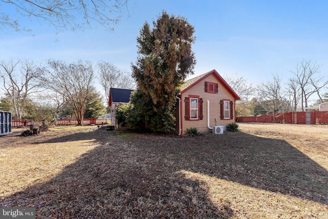 view of front of house with fence