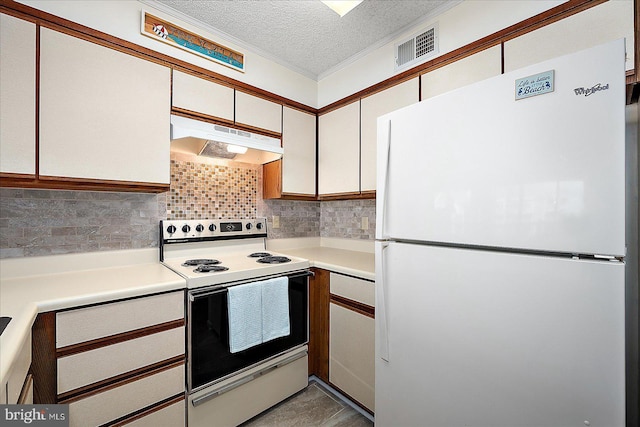 kitchen featuring under cabinet range hood, visible vents, white appliances, and decorative backsplash