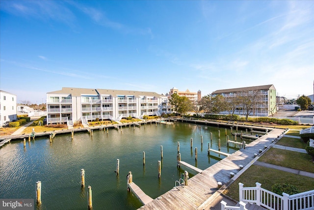 dock area with a water view