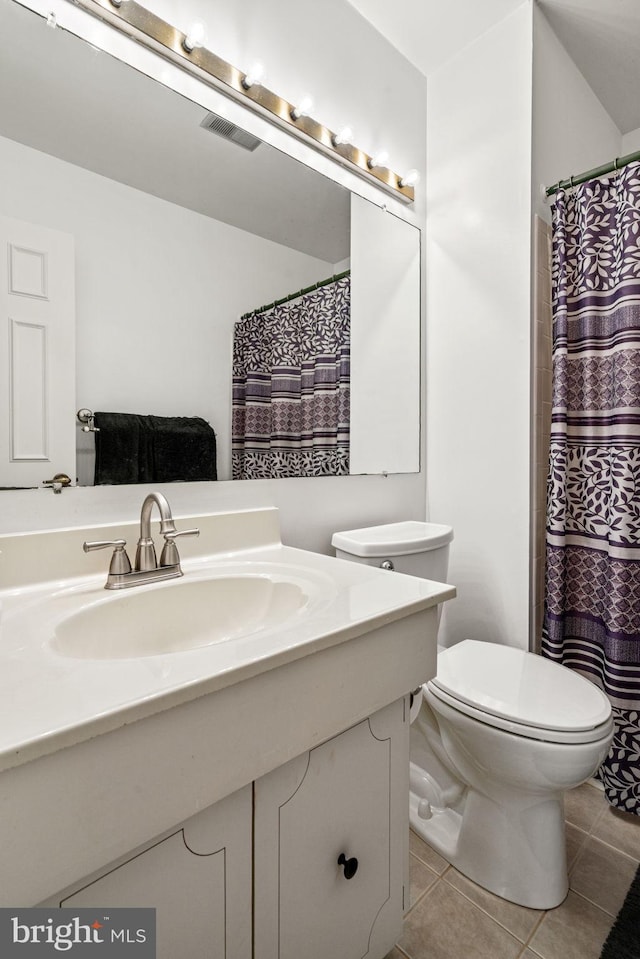 4504 Little River Run Dr, Annandale, VA 22003 - full bathroom featuring tile patterned floors, vanity, and toilet