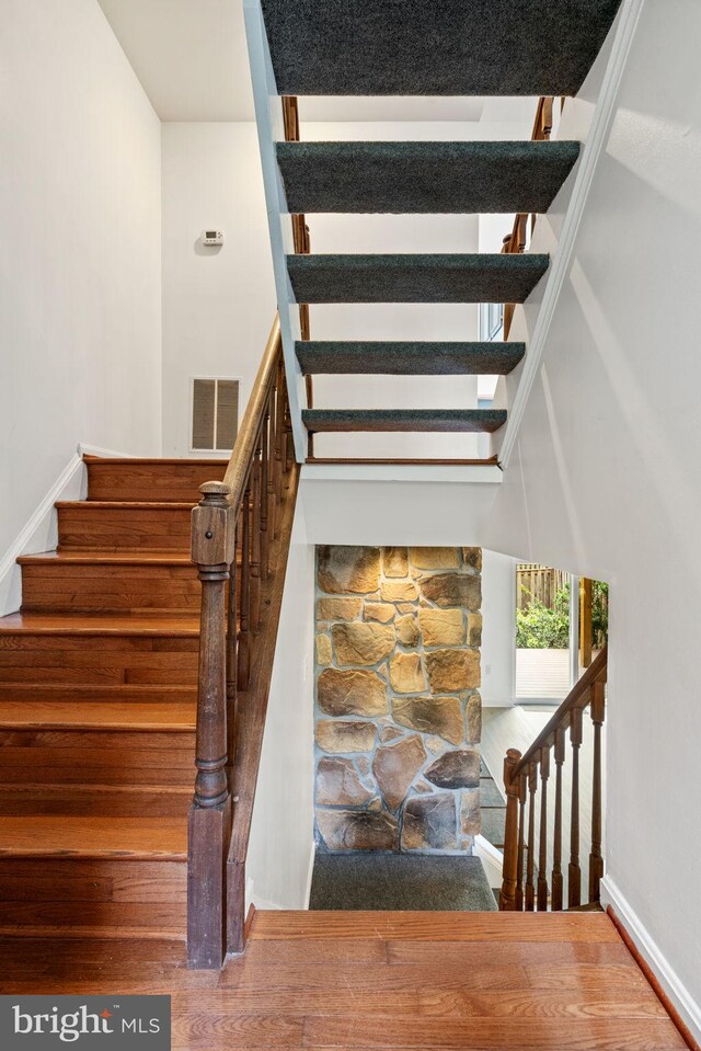 4504 Little River Run Dr, Annandale, VA 22003 - stairs with baseboards and wood finished floors