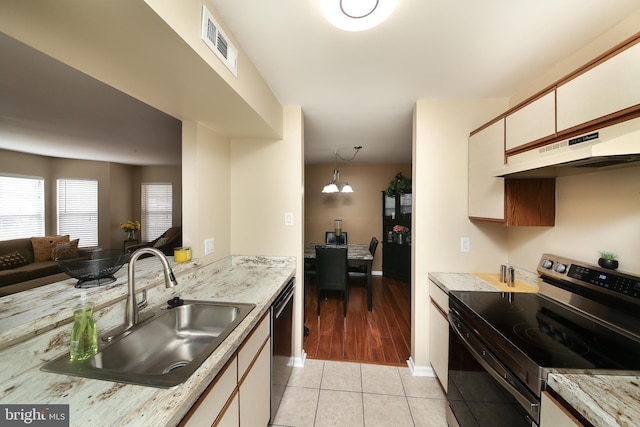 kitchen with visible vents, dishwasher, electric stove, under cabinet range hood, and a sink