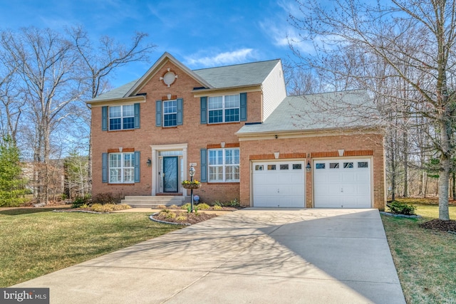 colonial home featuring a front lawn, an attached garage, brick siding, and driveway